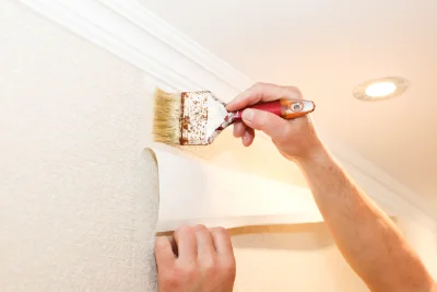 Pose de papier peint à Oudezeele — revêtements muraux et toiles de verre